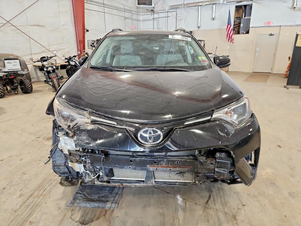 Photo 5 from auction – 2016 TOYOTA RAV4 with VIN 2T3RFREV1GW487696