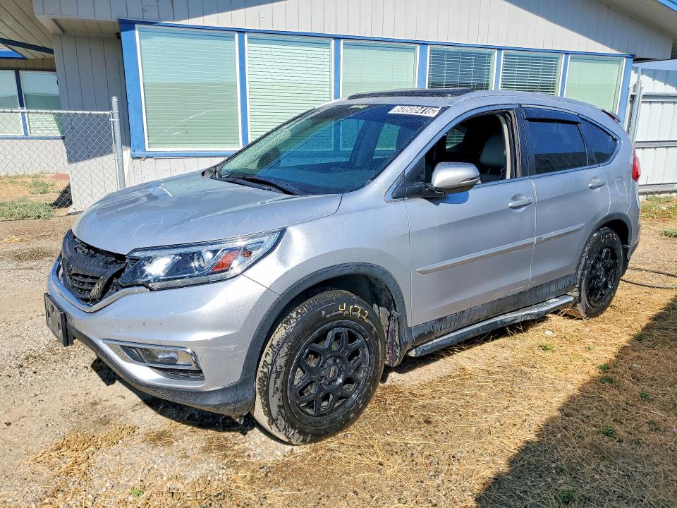 HONDA CR-V 2016 with VIN 5J6RM4H90GL123211 - Photo from auction