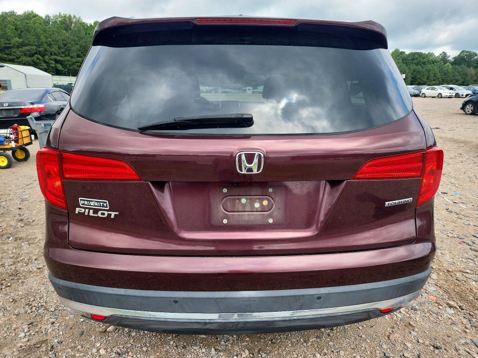 Photo 6 from auction – 2016 HONDA PILOT with VIN 5FNYF5H91GB051326