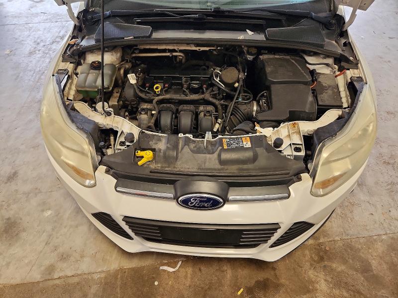 Photo 11 from auction – 2014 FORD FOCUS with VIN 1FADP3F22EL277090