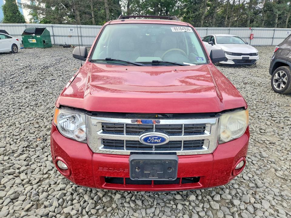 Снимка 5 от търг – 2011 FORD ESCAPE с VIN 1FMCU9D7XBKB09176