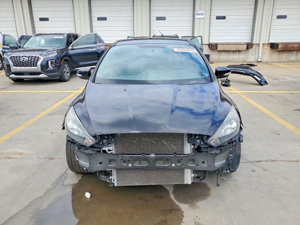 Photo 5 from auction – 2016 FORD FOCUS with VIN 1FADP3L99GL371245