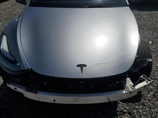 Photo 11 from auction – 2024 TESLA MODEL Y with VIN 7SAYGDEF2RA312368