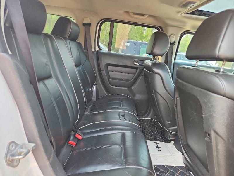 Photo 11 from auction – 2006 HUMMER H3 with VIN 5GTDN136768236172
