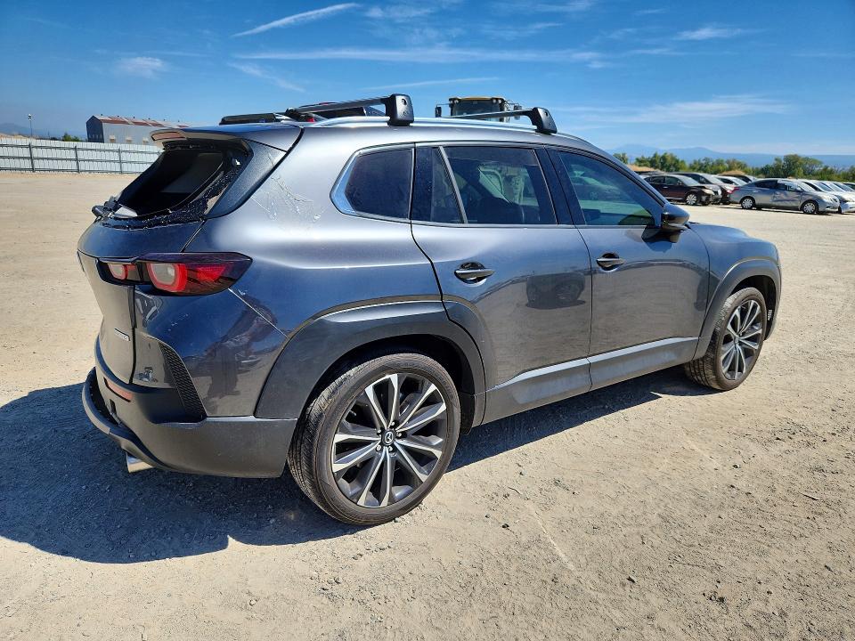 Photo 3 from auction – 2023 MAZDA CX-50 with VIN 7MMVABEM0PN104494