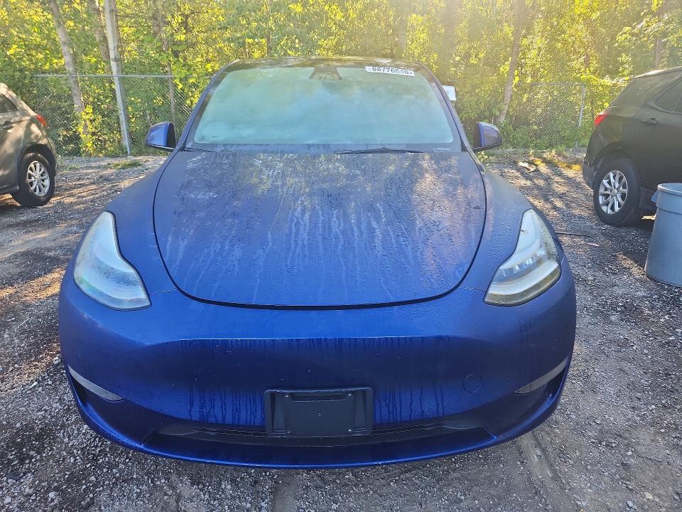 Photo 5 from auction – 2021 TESLA MODEL Y with VIN 5YJYGDEE4MF185557
