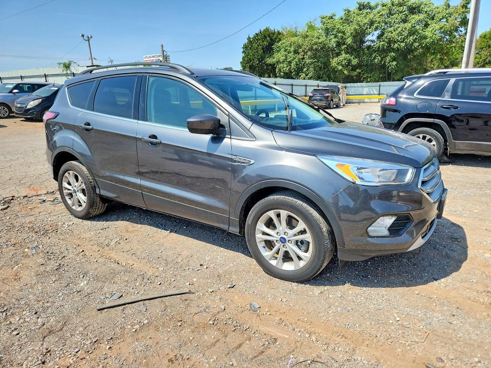 Photo 4 from auction – 2018 FORD ESCAPE with VIN 1FMCU9GD6JUB75468