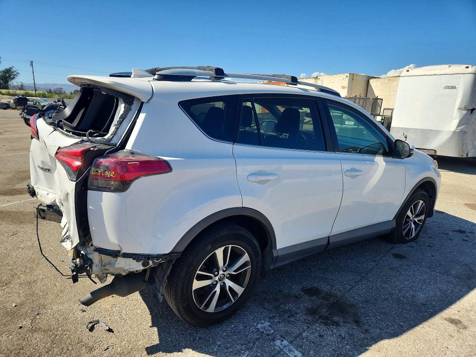 Photo 3 from auction – 2016 TOYOTA RAV4 with VIN 2T3WFREV6GW265626