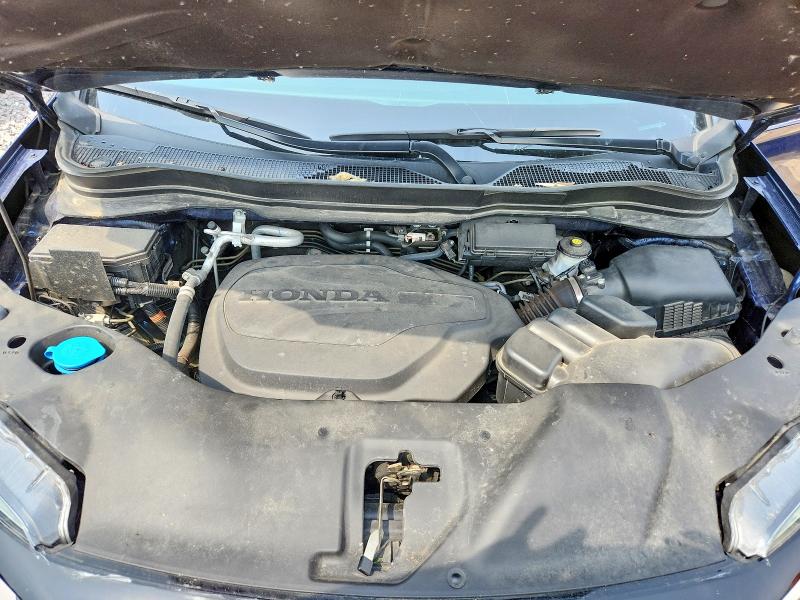 Photo 12 from auction – 2021 HONDA PASSPORT with VIN 5FNYF8H93MB015165