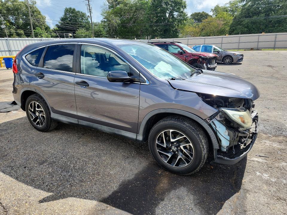 Photo 4 from auction – 2016 HONDA CR-V with VIN 2HKRM3H48GH558695