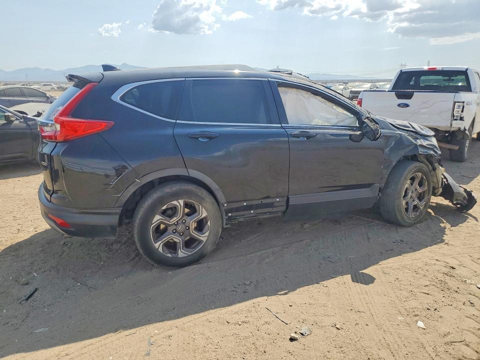 Photo 3 from auction – 2019 HONDA CR-V with VIN 7FARW2H52KE061070