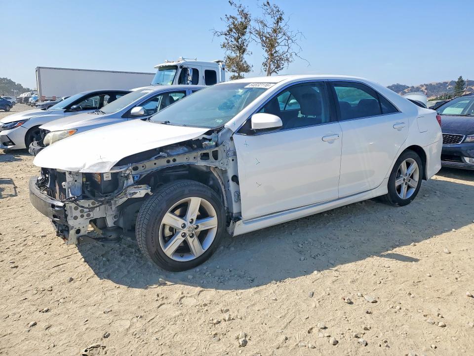 TOYOTA CAMRY 2014 with VIN 4T1BF1FKXEU731035 - Photo from auction