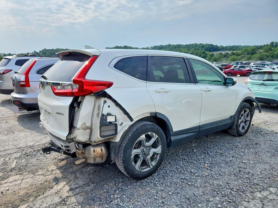 Photo 3 from auction – 2017 HONDA CR-V with VIN 2HKRW2H83HH611084