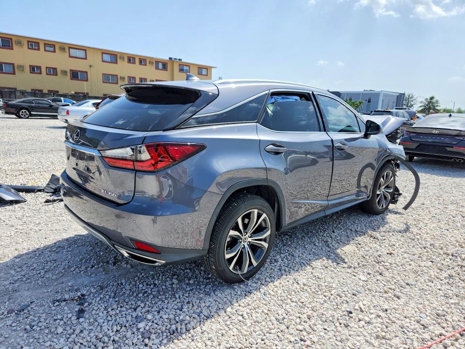 Photo 3 from auction – 2021 LEXUS RX with VIN 2T2HZMAA2MC211974