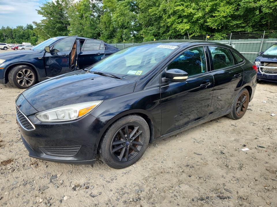 FORD FOCUS 2015 with VIN 1FADP3F25FL365083 - Photo from auction
