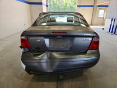 Zdjęcie 6 z aukcji – 2006 FORD FOCUS z VIN 1FAFP34N06W237385