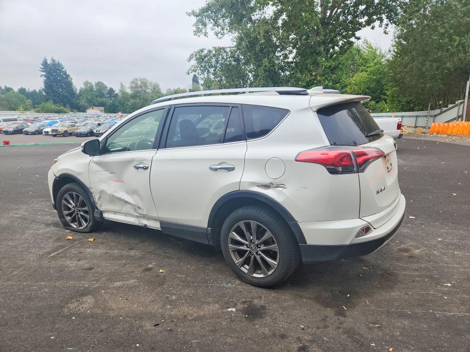 Photo 2 from auction – 2018 TOYOTA RAV4 with VIN JTMDFREV7JJ733084