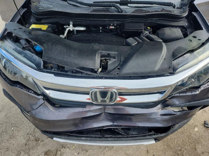 Photo 12 from auction – 2021 HONDA PILOT with VIN 5FNYF5H56MB014488