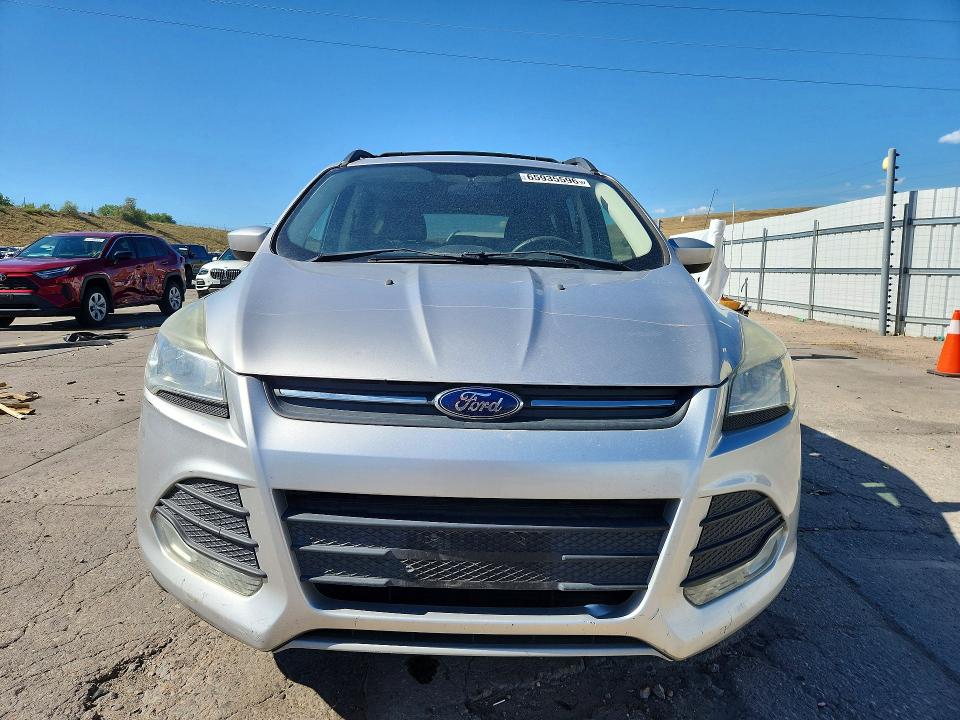 Photo 5 from auction – 2014 FORD ESCAPE with VIN 1FMCU9GX1EUC68186