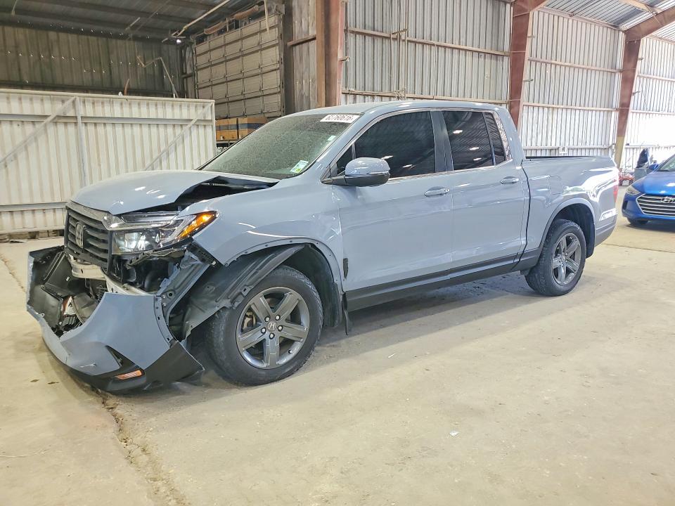 HONDA RIDGELINE 2023 with VIN 5FPYK3F52PB038561 - Photo from auction