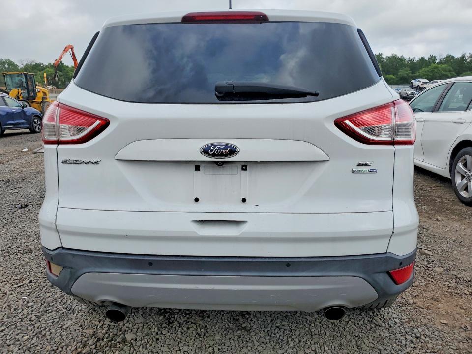 Photo 6 from auction – 2014 FORD ESCAPE with VIN 1FMCU9GX2EUA42500