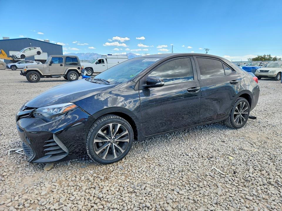 TOYOTA COROLLA 2017 with VIN 5YFBURHE3HP663193 - Photo from auction