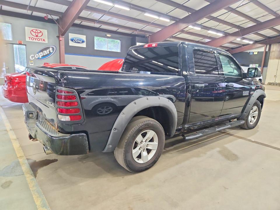 Photo 3 from auction – 2014 RAM 1500 with VIN 1C6RR7KT9ES125790