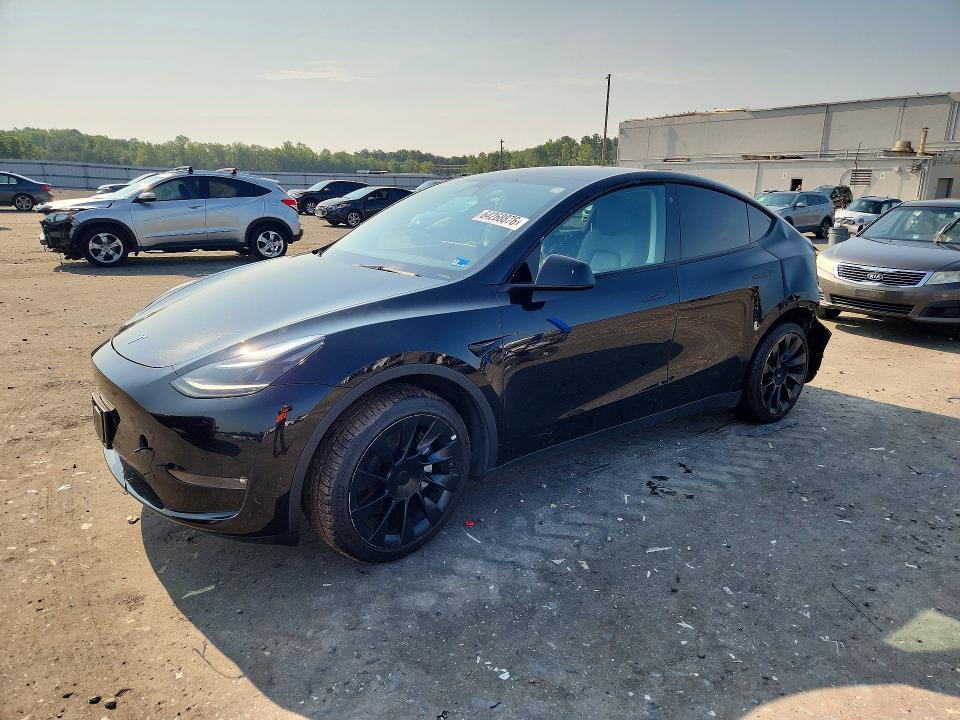 TESLA MODEL Y 2023 with VIN 7SAYGAEE5PF696829 - Photo from auction