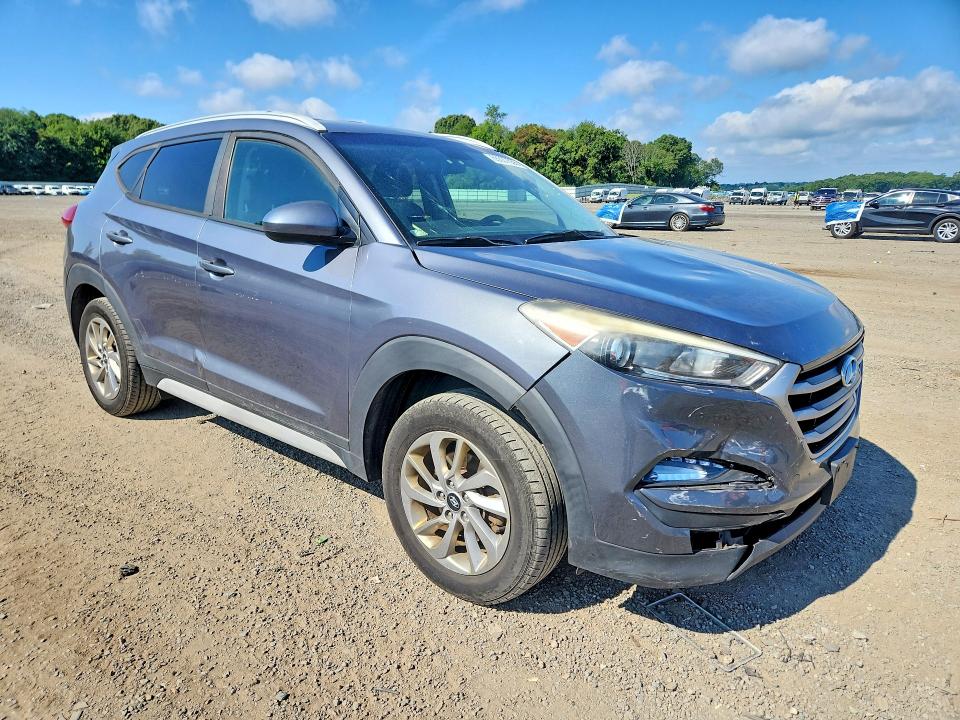 Photo 4 from auction – 2018 HYUNDAI TUCSON with VIN KM8J3CA4XJU651785