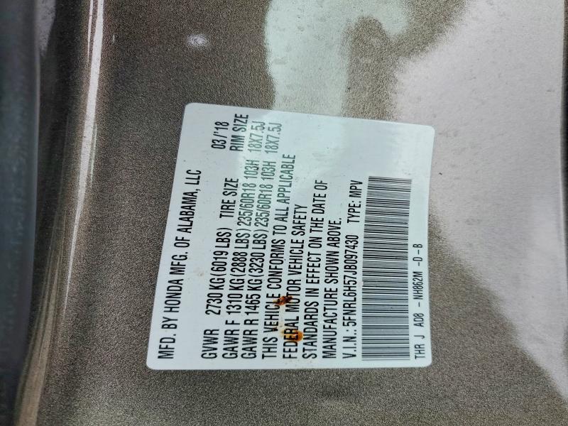 Photo 14 from auction – 2018 HONDA ODYSSEY with VIN 5FNRL6H57JB097430