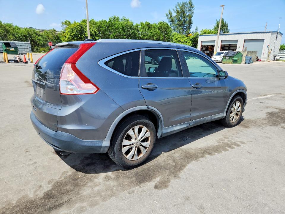 Photo 3 from auction – 2014 HONDA CR-V with VIN 5J6RM3H7XEL015572