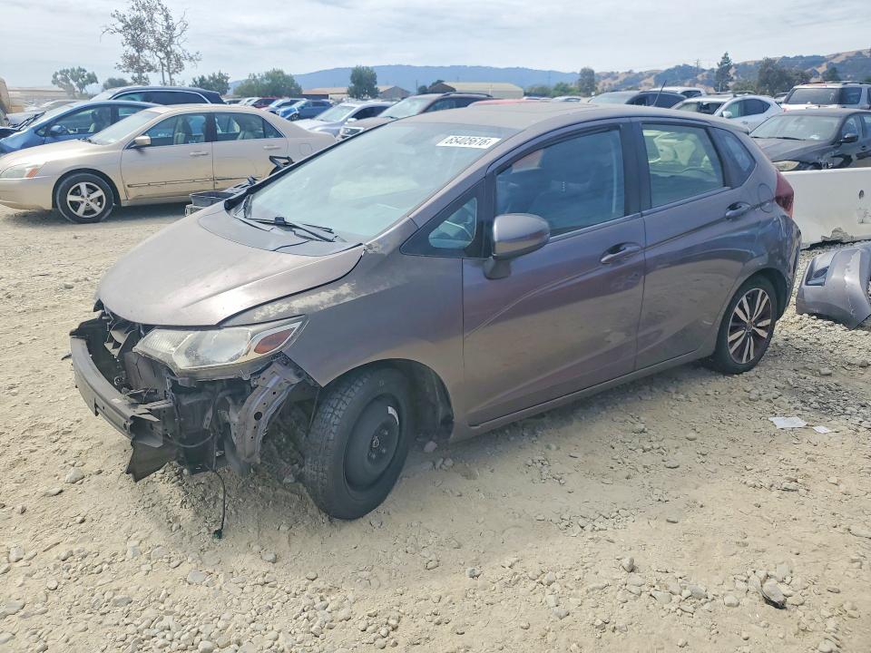 HONDA FIT 2016 with VIN JHMGK5H86GS016233 - Photo from auction
