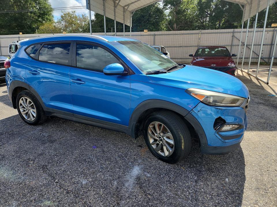 Photo 4 from auction – 2016 HYUNDAI TUCSON with VIN KM8J33A40GU125819