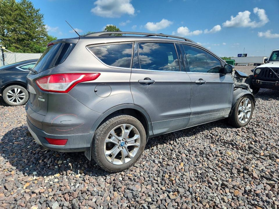 Photo 3 from auction – 2013 FORD ESCAPE with VIN 1FMCU0H90DUD00877