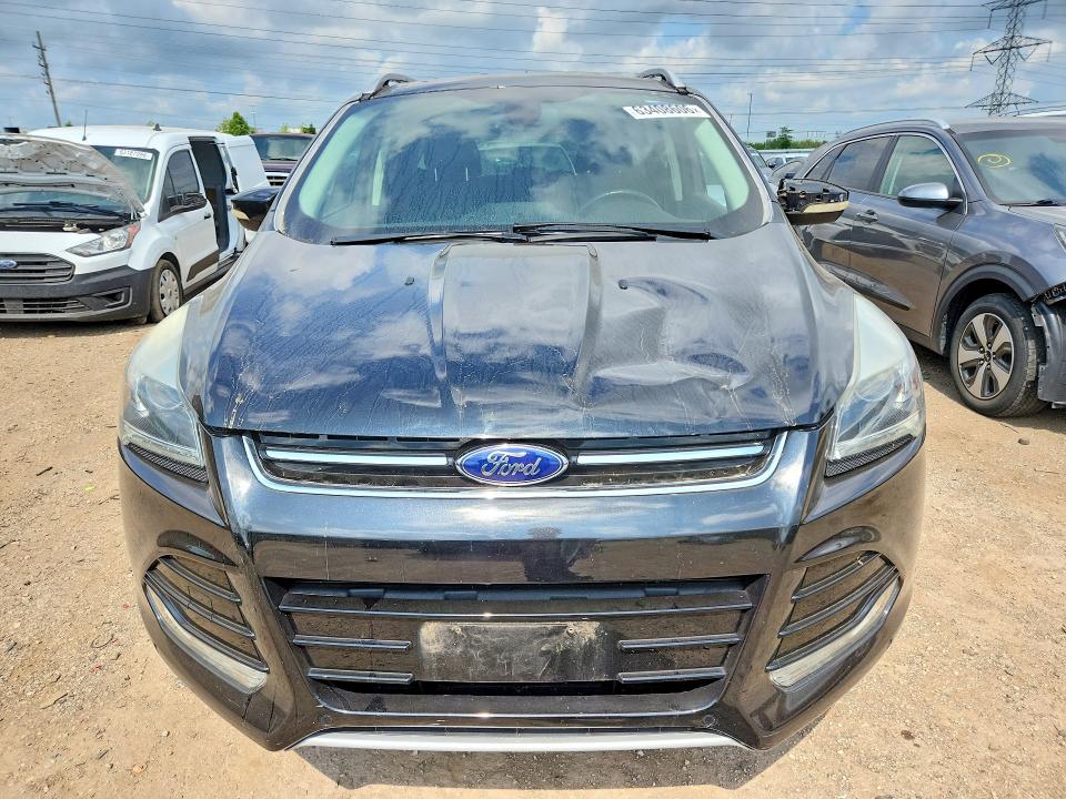 Photo 5 from auction – 2014 FORD ESCAPE with VIN 1FMCU0JXXEUC58566