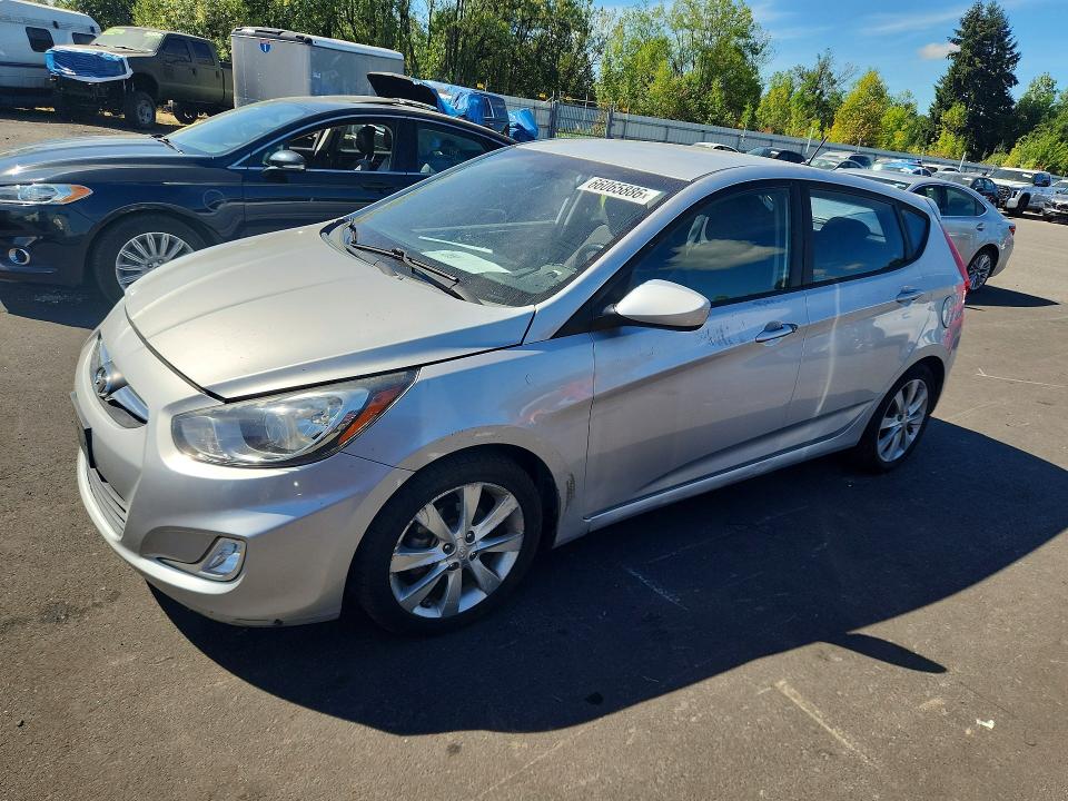 HYUNDAI ACCENT 2012 with VIN KMHCU5AEXCU053659 - Photo from auction
