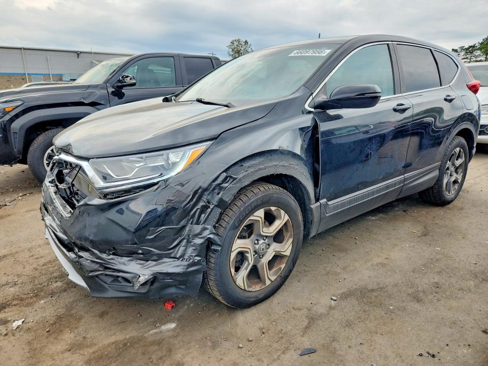 HONDA CR-V 2018 with VIN 7FARW2H84JE000120 - Photo from auction