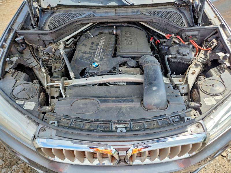 Photo 11 from auction – 2014 BMW 5 SERIES with VIN 5UXKR0C57E0C27877