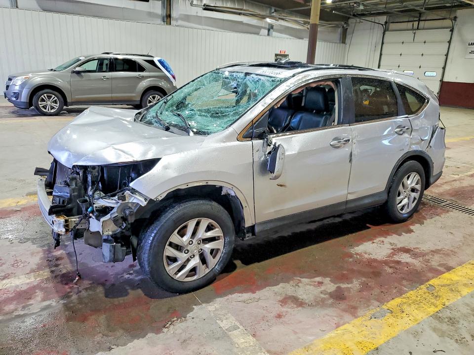 HONDA CR-V 2015 with VIN 2HKRM4H77FH649911 - Photo from auction