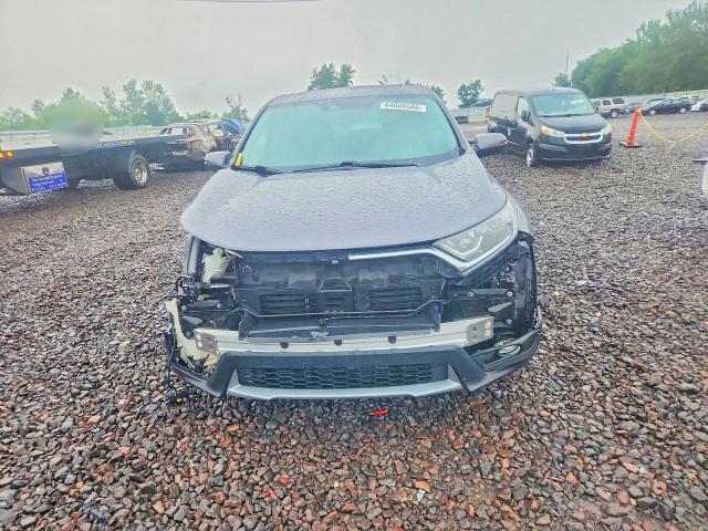 Photo 5 from auction – 2018 HONDA CR-V with VIN 7FARW2H87JE085177