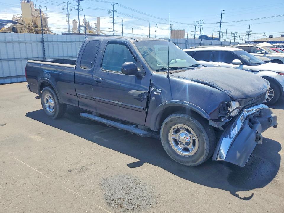 Photo 4 from auction – 2000 FORD F150 with VIN 1FTRX17L9YKA70573