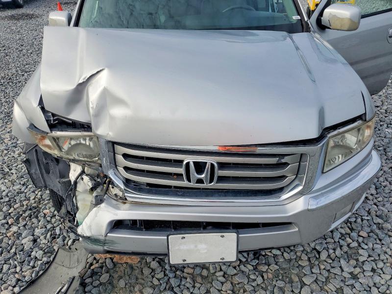 Photo 11 from auction – 2014 HONDA RIDGELINE with VIN 5FPYK1F55EB006771