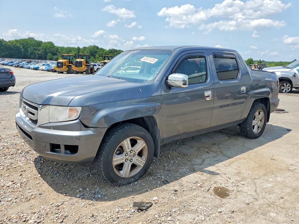 HONDA RIDGELINE 2011 with VIN 5FPYK1F51BB009324 - Photo from auction