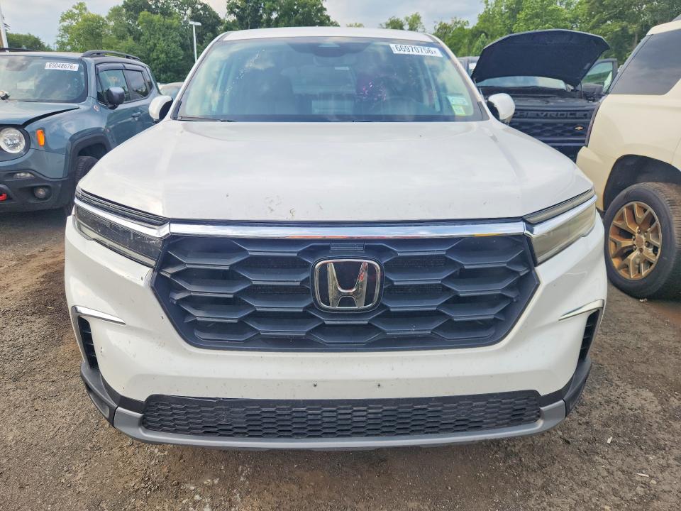 Photo 5 from auction – 2023 HONDA PILOT with VIN 5FNYG2H50PB010954