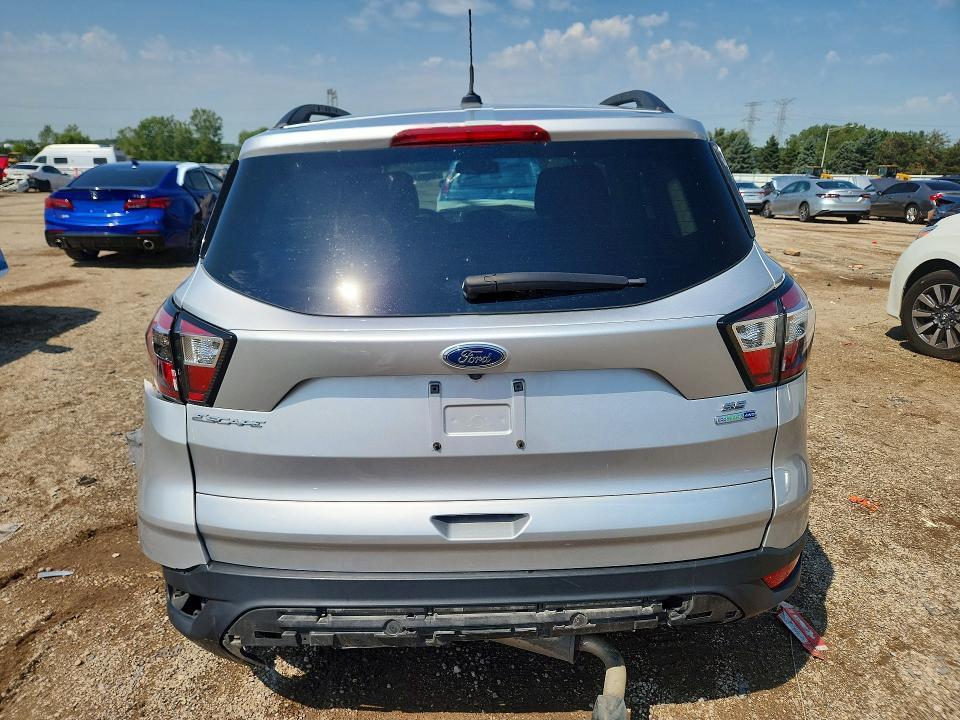 Photo 6 from auction – 2018 FORD ESCAPE with VIN 1FMCU9GD9JUA02480