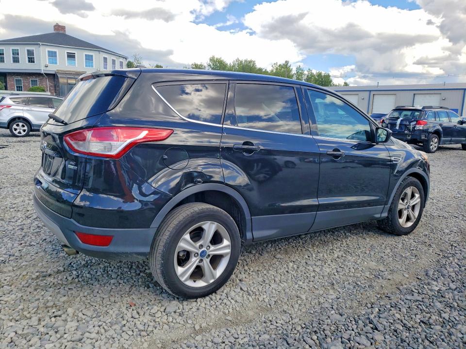 Photo 3 from auction – 2014 FORD ESCAPE with VIN 1FMCU9G99EUD32508