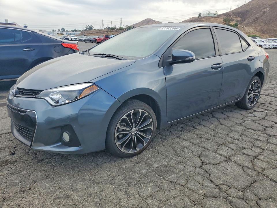 TOYOTA COROLLA 2014 с VIN 5YFBURHE5EP067286 - Снимка от търг