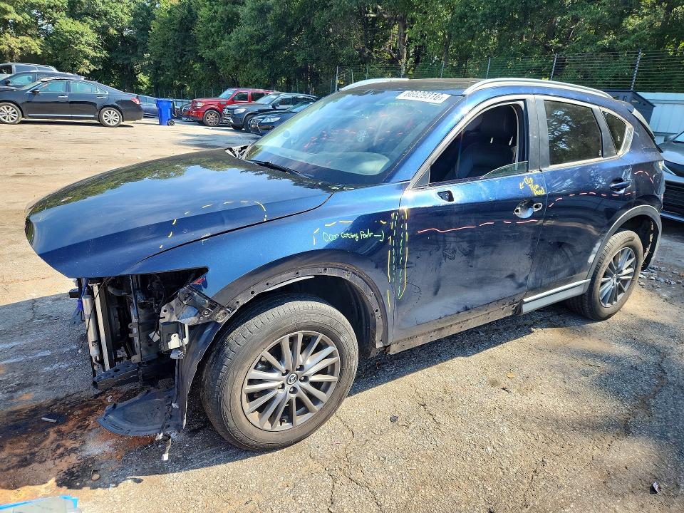 MAZDA CX-5 2021 with VIN JM3KFACMXM0362510 - Photo from auction