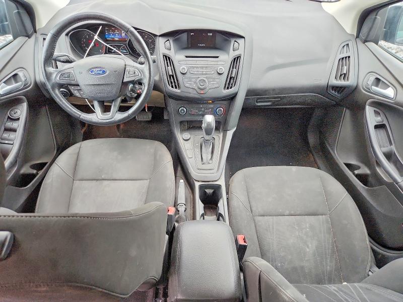 Photo 8 from auction – 2016 FORD FOCUS with VIN 1FADP3F22GL220634