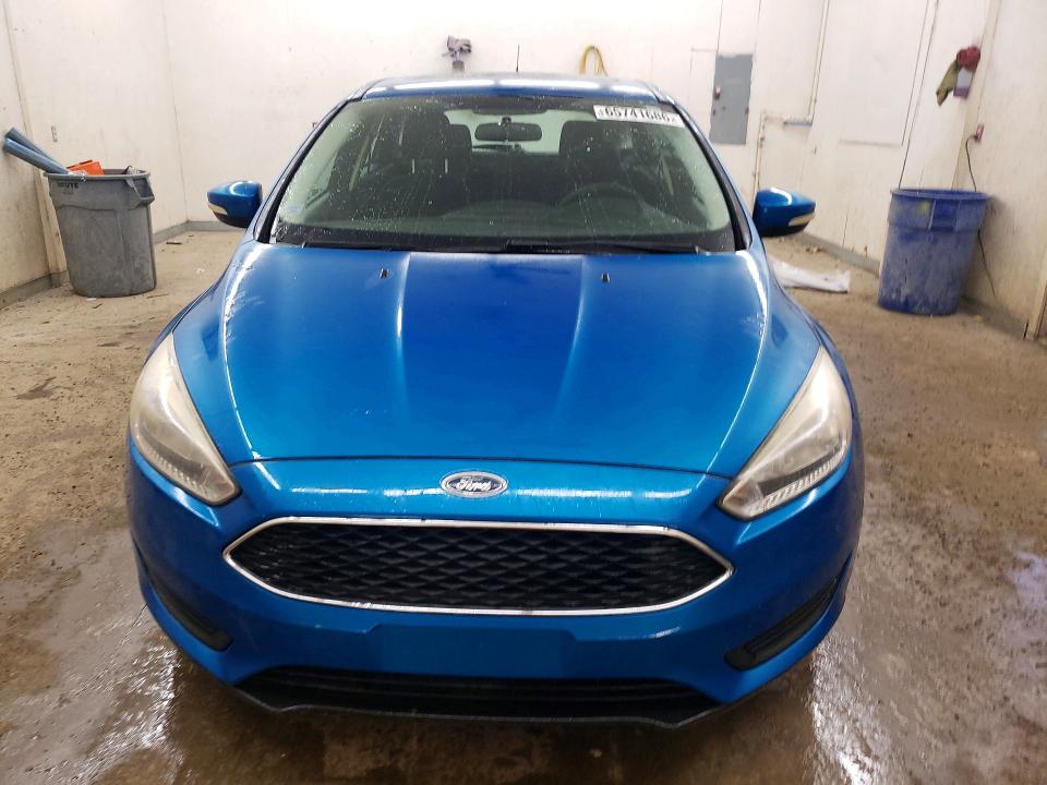 Photo 5 from auction – 2016 FORD FOCUS with VIN 1FADP3K23GL201080